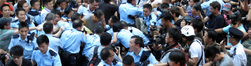 HK Police amidst a confrontation between opposing groups in Mong Kok